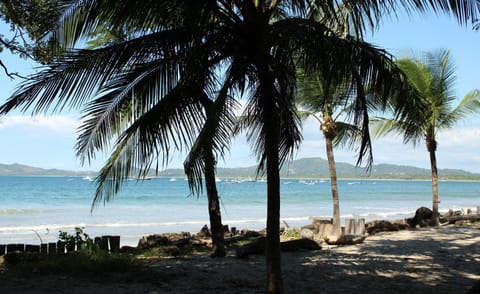 On the beach, sun loungers, beach towels