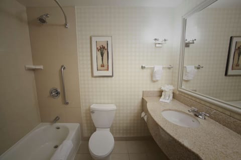 Suite, One King Bed | Bathroom | Hair dryer, towels