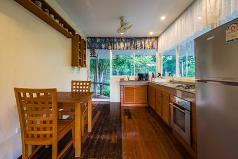 1-Bedroom Villa in the Garden | Private kitchen | Full-size fridge, microwave, stovetop, electric kettle