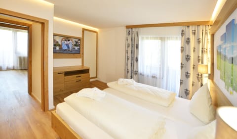 Junior Suite, 1 Bedroom, Garden Area (Seefeld) | Hypo-allergenic bedding, down comforters, in-room safe