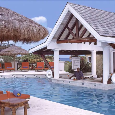 Outdoor pool, pool umbrellas, sun loungers