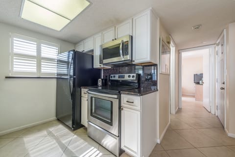 Premium Condo, 2 Bedrooms, Oceanfront | Private kitchen | Fridge, microwave, oven, stovetop