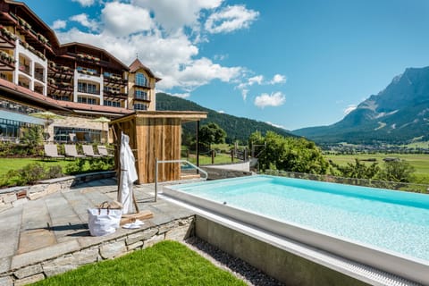 Indoor pool, outdoor pool, pool umbrellas