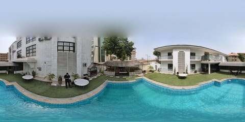 Outdoor pool, pool umbrellas, sun loungers