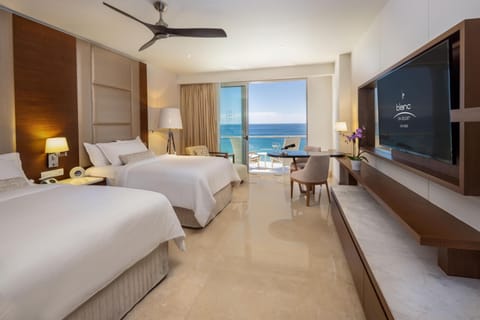 Royale Deluxe Ocean View - Two Double Beds | Premium bedding, down comforters, free minibar, in-room safe