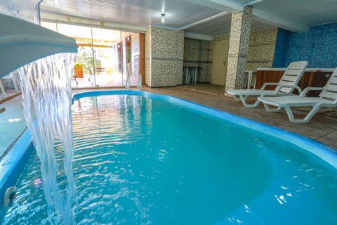 Indoor pool, sun loungers