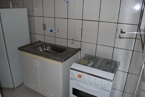 Apartment | Private kitchen | Fridge, microwave, stovetop, cookware/dishes/utensils