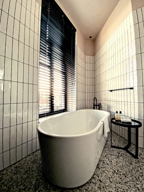 Superior Double Room, Bathtub | Bathroom | Separate tub and shower, deep soaking tub, rainfall showerhead