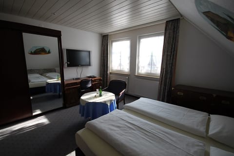 Double Room | Minibar, in-room safe, desk, iron/ironing board