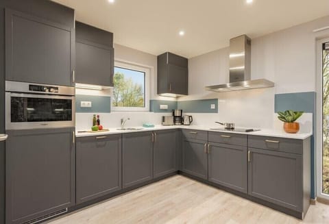 Deluxe Cottage, 1 Bedroom | Private kitchen | Fridge, microwave, stovetop, dishwasher