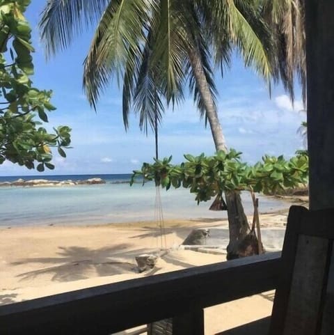 On the beach, sun loungers