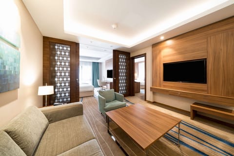 Suite, 2 Bedrooms | Living area | TV