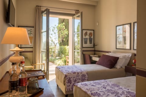 Superior Twin Room, 2 Twin Beds, Patio, Ground Floor | Premium bedding, down comforters, pillowtop beds, minibar