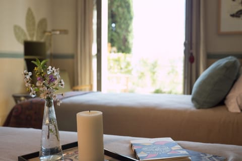 Premium bedding, down comforters, pillowtop beds, minibar