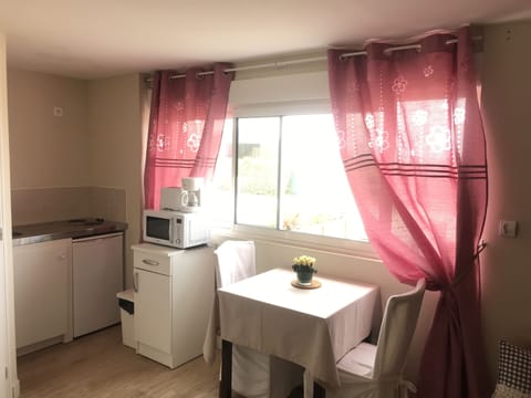 Comfort Studio, 1 Queen Bed, Kitchenette, Partial Sea View | Premium bedding, individually decorated, individually furnished, desk