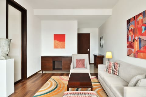 Executive Suite, 1 King Bed, Non Smoking, City View (Corner) | 1 bedroom, minibar, in-room safe, individually decorated