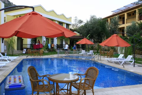 Outdoor pool, open 9:30 AM to 8:30 PM, pool umbrellas, sun loungers