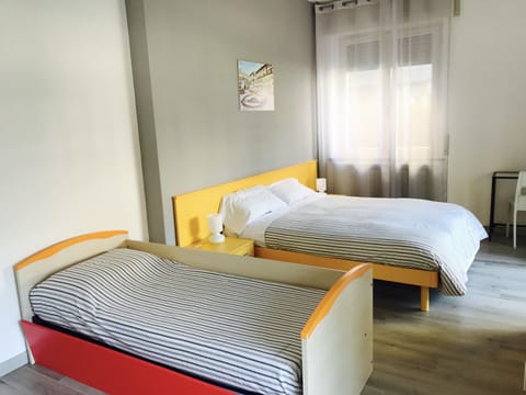 Basic Triple Room, 1 Bedroom, Shared Bathroom | Individually decorated, individually furnished, free WiFi, bed sheets