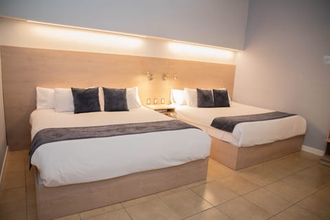 Room, 2 Queen Beds | Minibar, free WiFi, bed sheets