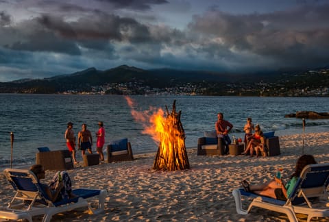 On the beach, white sand, free beach cabanas, sun loungers