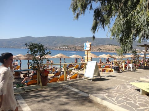 On the beach, sun loungers, beach umbrellas, beach towels