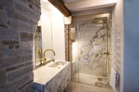 Shower, rainfall showerhead, designer toiletries, hair dryer