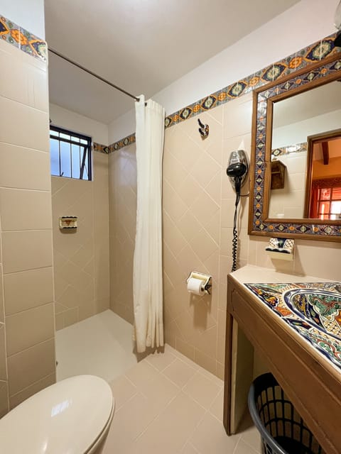 Standard Room, 2 Double Beds | Bathroom | Shower, free toiletries, hair dryer, towels