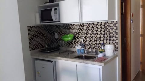 Quadruple Room (A20) | Private kitchen | Microwave, stovetop, cookware/dishes/utensils