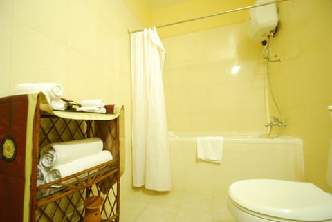 Combined shower/tub, hair dryer, bathrobes, slippers