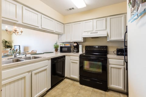 2 Bedroom, 2 Bathroom, Oceanview Condo | Private kitchen | Fridge, microwave, stovetop, cookware/dishes/utensils