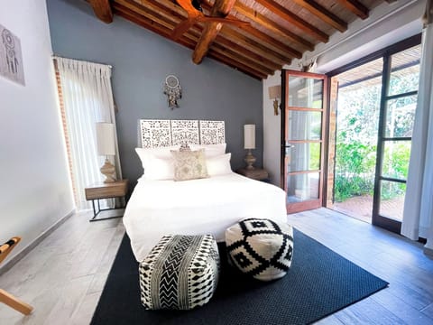 Deluxe Double Room, Garden Area | Minibar, in-room safe, blackout drapes, free WiFi