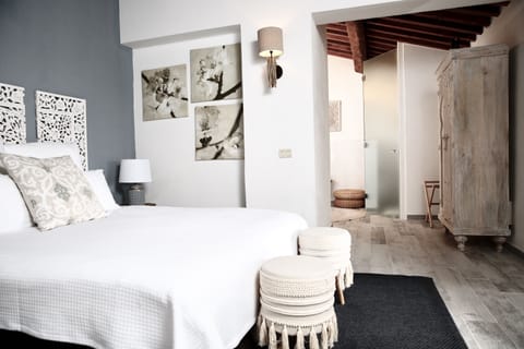 Deluxe Double Room, Garden Area | Minibar, in-room safe, blackout drapes, free WiFi