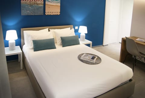 Basic Double Room (Blu) | Premium bedding, desk, rollaway beds, free WiFi
