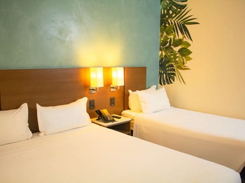 Triple Room, Multiple Beds | Premium bedding, pillowtop beds, in-room safe, desk