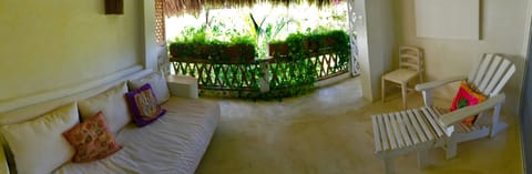 Signature Suite, 1 King Bed, Balcony, Pool View (Cacao) | Living room | Flat-screen TV