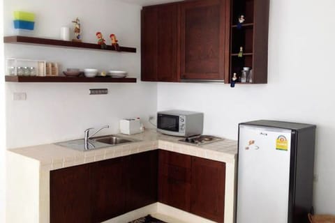 One Bedroom Condominium | Private kitchenette | Fridge, microwave, stovetop, electric kettle