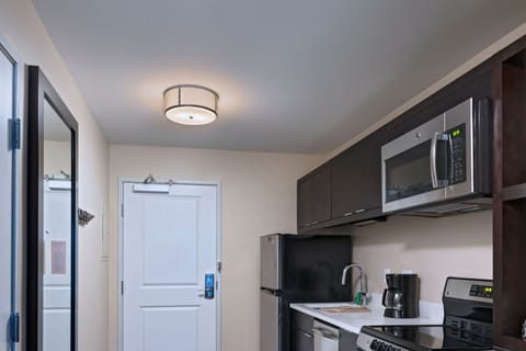 Suite, 1 Bedroom | In-room safe, desk, iron/ironing board, free cribs/infant beds