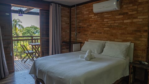 Premium Vista Piscina | 1 bedroom, minibar, bed sheets