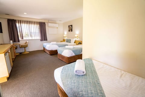 Family Room | Minibar, in-room safe, iron/ironing board, free WiFi