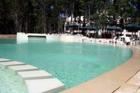 2 indoor pools, 2 outdoor pools, pool umbrellas