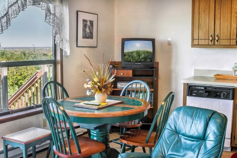 Deluxe Condo, Oceanfront | Living area | Flat-screen TV, fireplace