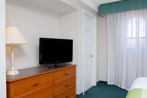 1 King Bed, One-Bedroom Suite, Non-Smoking | Premium bedding, individually furnished, desk, blackout drapes