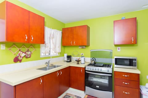 Family House, 2 Bedrooms, Kitchen, Partial Ocean View | Private kitchen | Full-size fridge, microwave, oven, stovetop