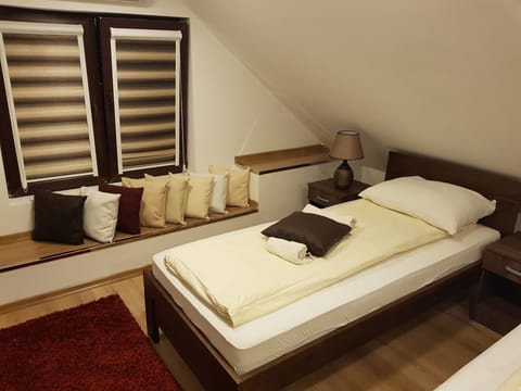 Standard Quadruple Room, 1 Bedroom | Individually decorated, individually furnished, free WiFi, bed sheets