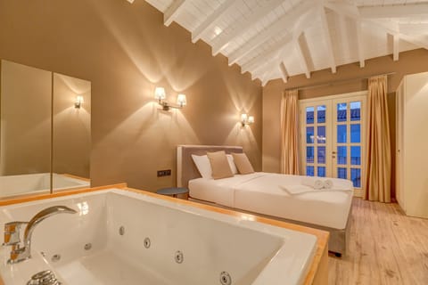 Superior Room, Jetted Tub | Living area | Flat-screen TV