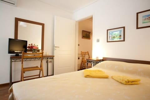 Deluxe Double Room, 2 Bedrooms, Garden View | Iron/ironing board, free cribs/infant beds, free WiFi, bed sheets