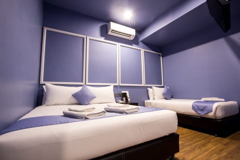 Executive Triple Room, No Windows | In-room safe, iron/ironing board, free WiFi, bed sheets