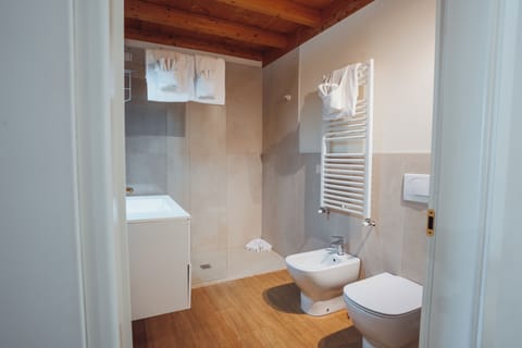 Family Quadruple Room, Garden View | Bathroom | Shower, free toiletries, hair dryer, bidet