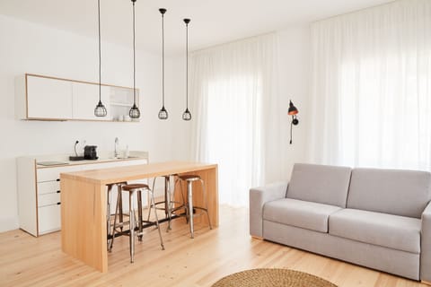 Apartment, 1 Bedroom | Living area | Flat-screen TV