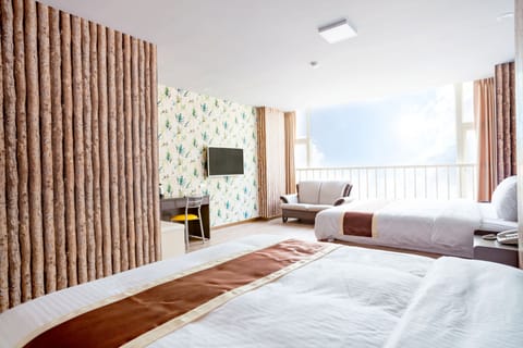 Deluxe Quadruple Room | Premium bedding, desk, soundproofing, free WiFi